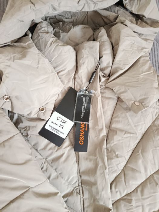 Пуховик новый 5000тг