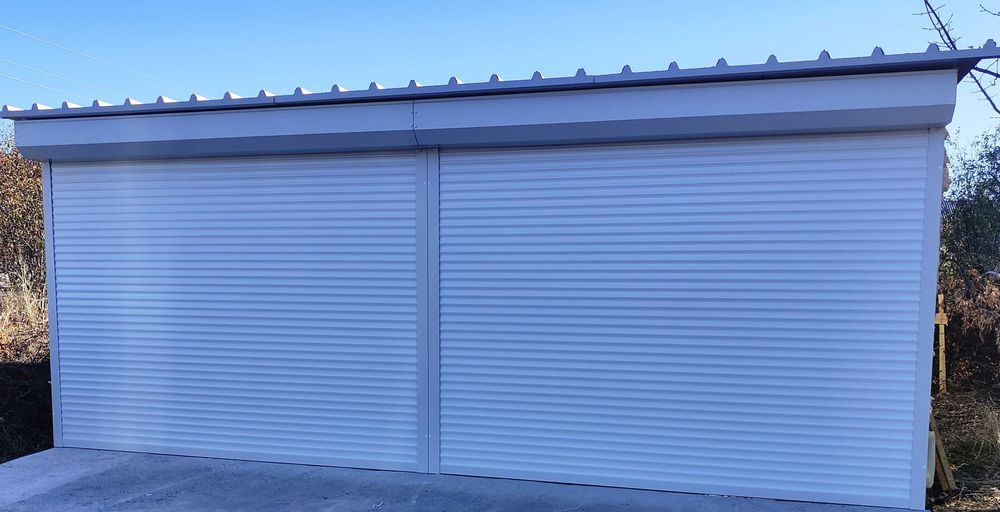 Montaj usi garaj sectionale, automatizari porti, preturi producator