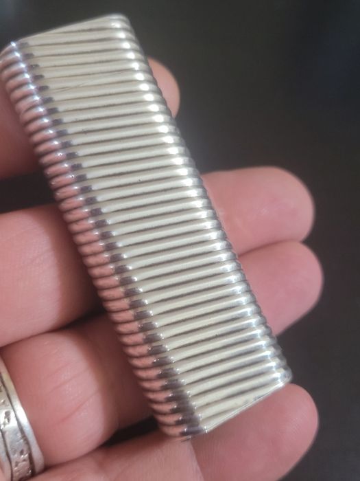 Brichetă Must de Cartier din argint masiv, piesă de colecție