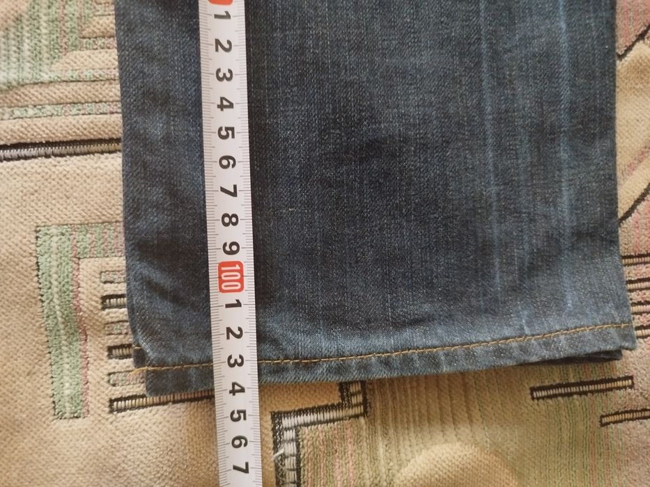 Фирменные джинсы