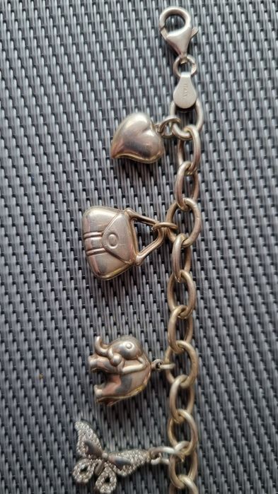 Сребърна гривна с сребърни талисмани