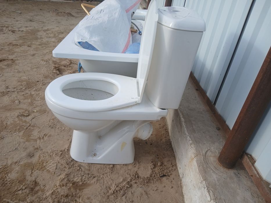 Унитаз б/у қолданылған