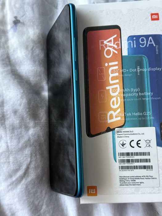 Redmi 9A 32 GB, комплект със зарядно и калъф