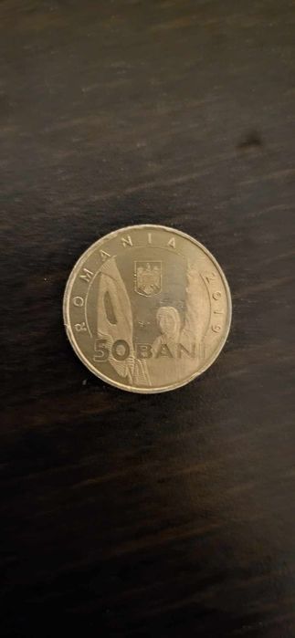 Vând moneda de la revolutie