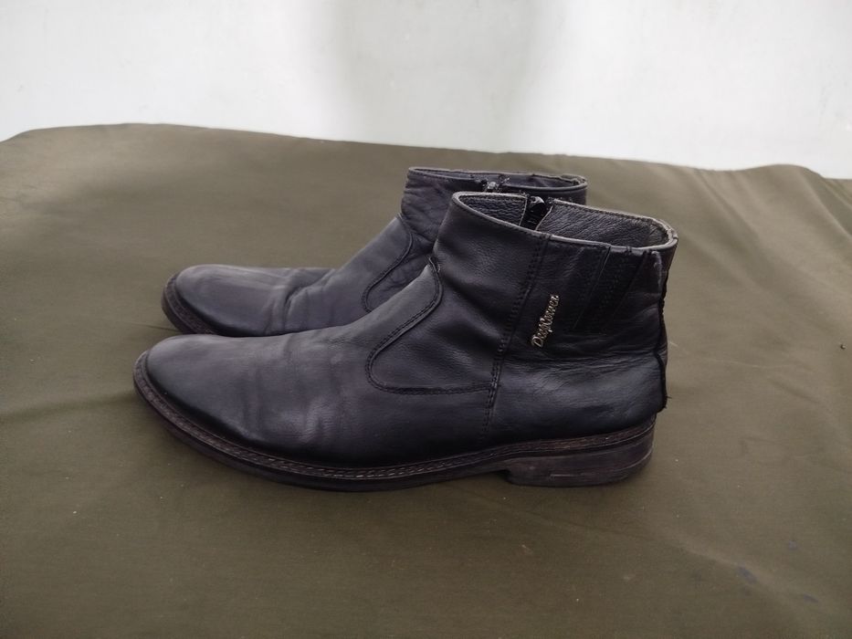 Продам фирменные сапоги.