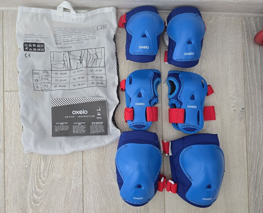 Role Oxelo reglabile mas 32-34 + set protectii  noi