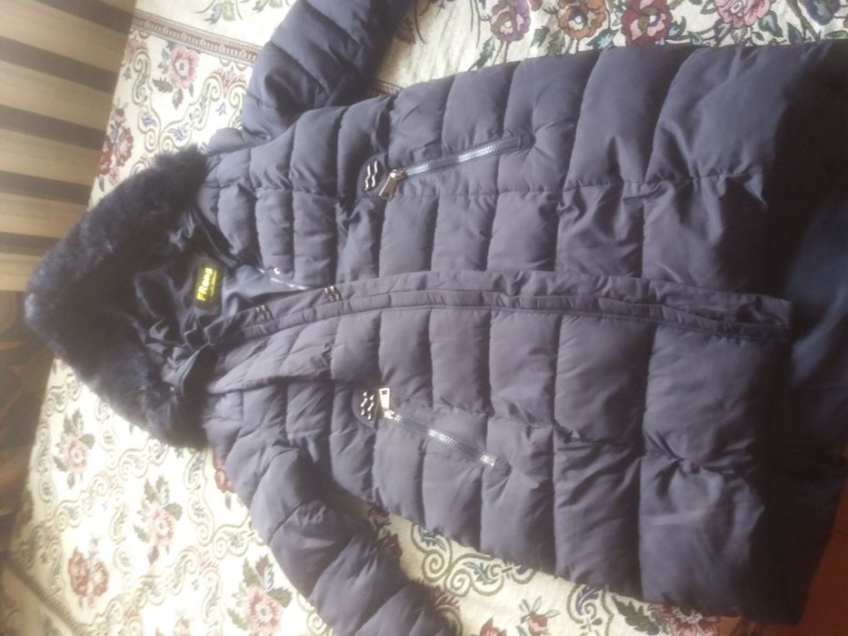 Пуховик женский .