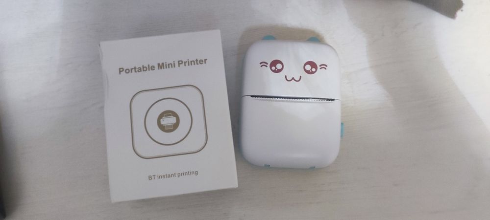 Мини принтер для печати без чернил работает