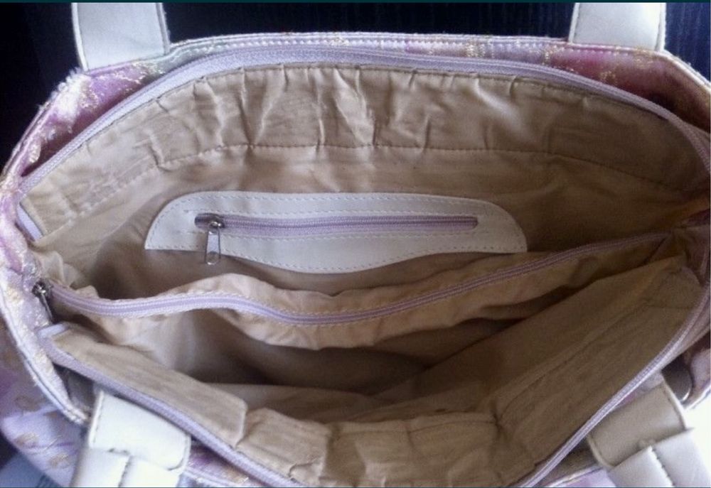 Елек пухенка - 2 броя + подарък чанта