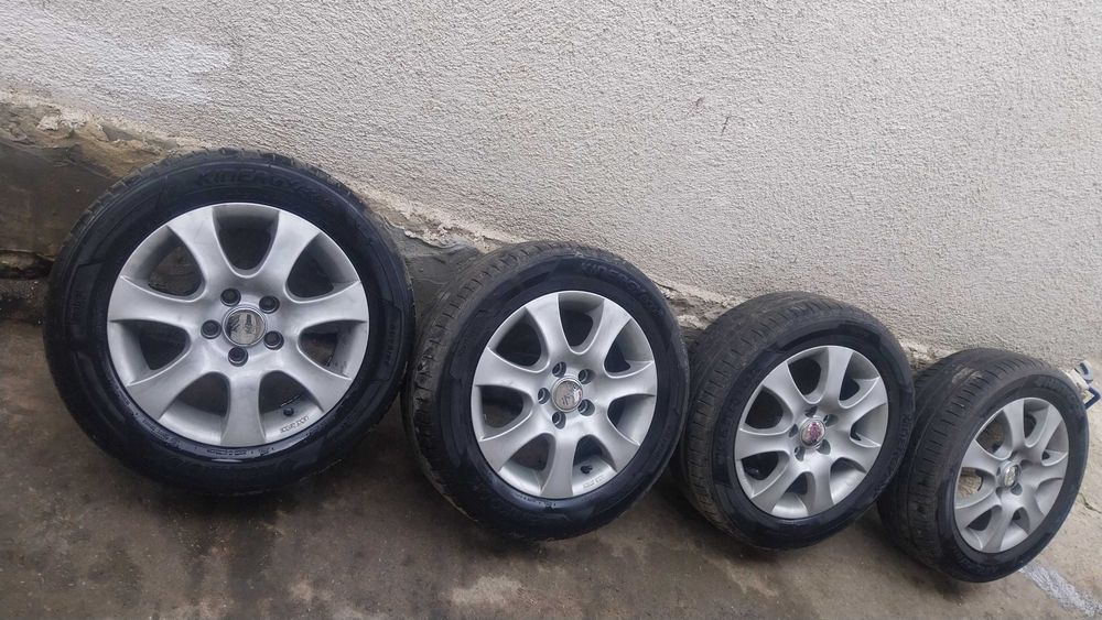 Jante aliaj pe 14in 5 prezoane cu cauciucuri de var pe ele 185/60/14