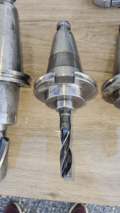 Lot of ISO 50 industrial tooling – arbors, milling heads, and boring head