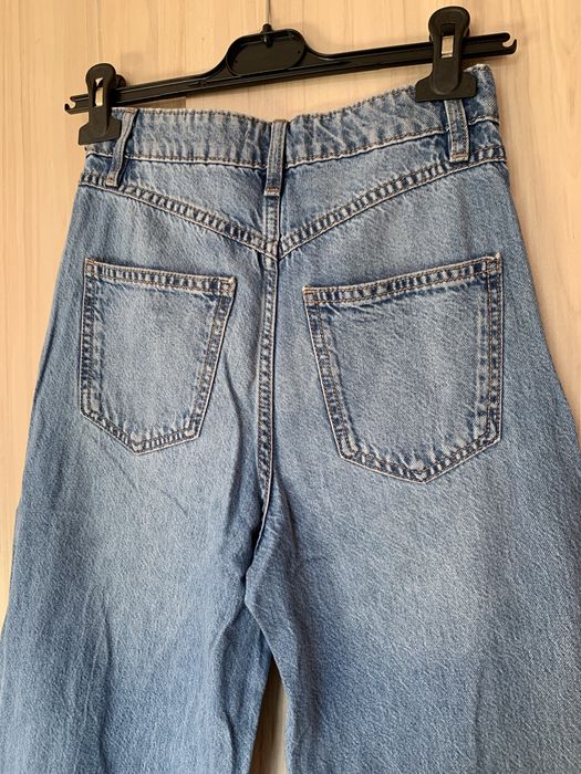 Дънки с подгънати широки крачоли