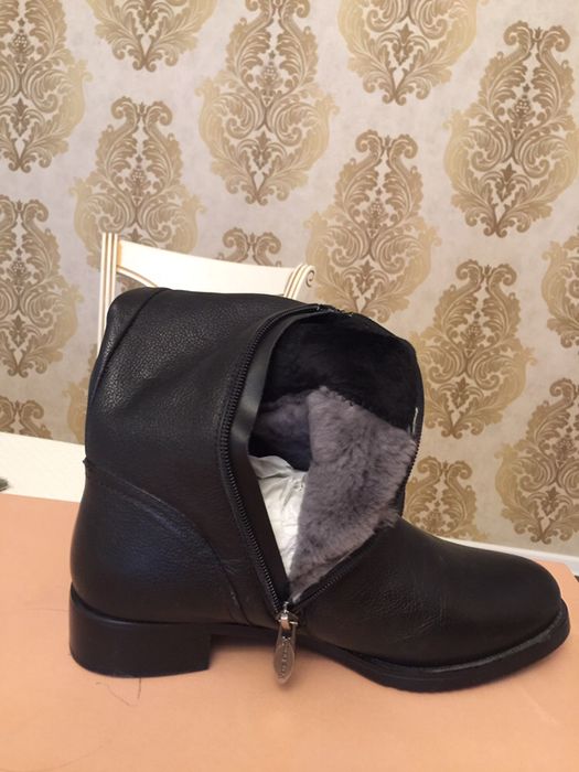 Продам новые сапоги