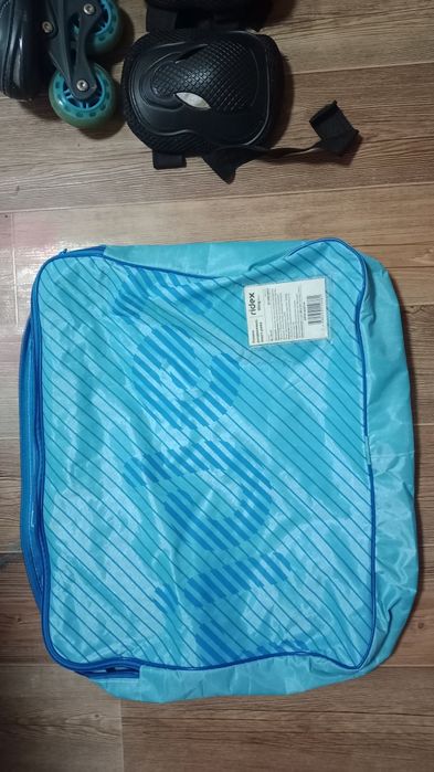 Роликовые коньки