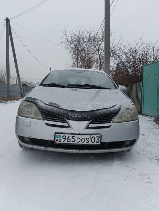 Ниссан примьера р12 2002г.