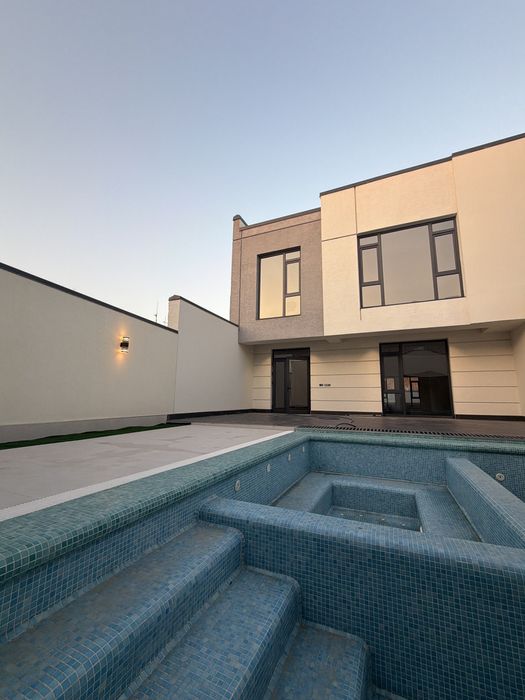 Мирзоулугбек район 3,2 сотки новый дом с бассейном