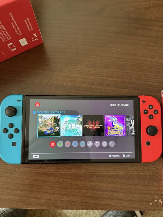 Nintendo Switch 1 OLED plus 3 jocuri