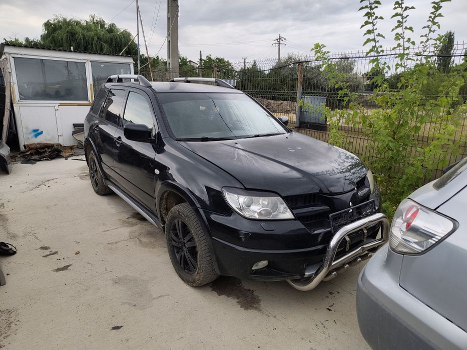 Dezmembrez mitsubishi outlander 2.0 benzina 2004