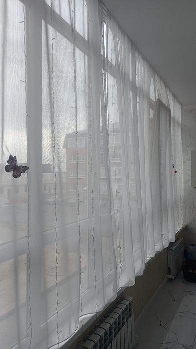 Занавески на балкон.