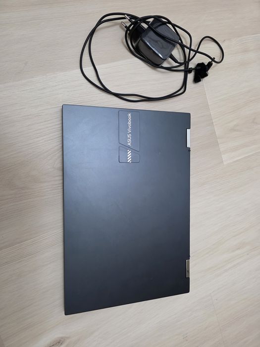 Vând laptop 2-in-1 ASUS VivoBook Flip 14 TP1401KA – touchscreen, rabatabil 360°