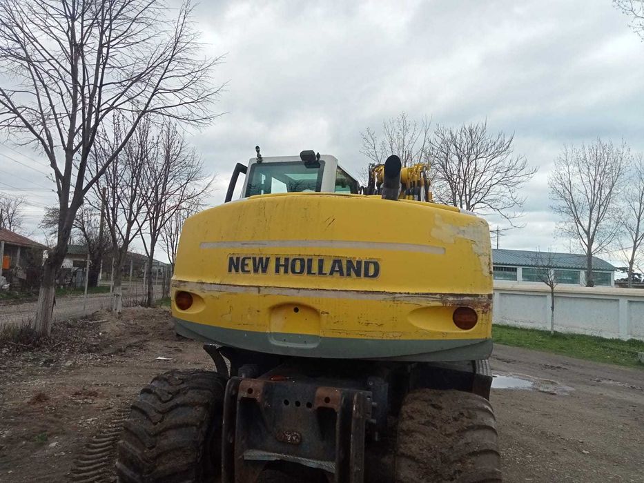 Vand/schimb Excavator New Holand MH City 16t