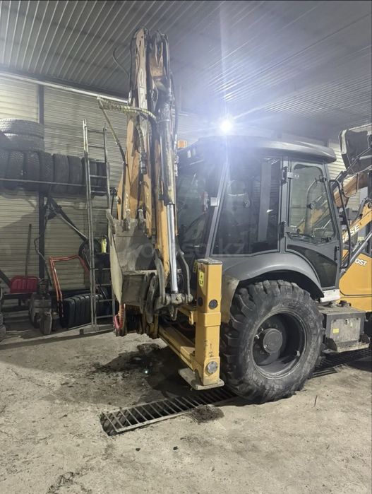 Эксоватор погрузчик Case 570zt