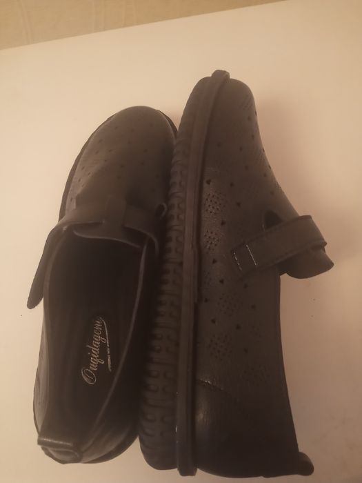 Новые кожаные туфли