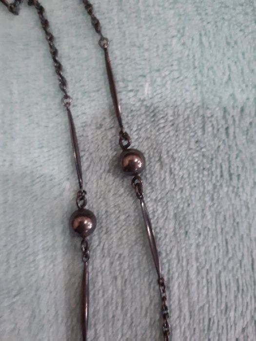 Продам ожерелье.Цепочка из чёрного серебра и чёрным жемчугом