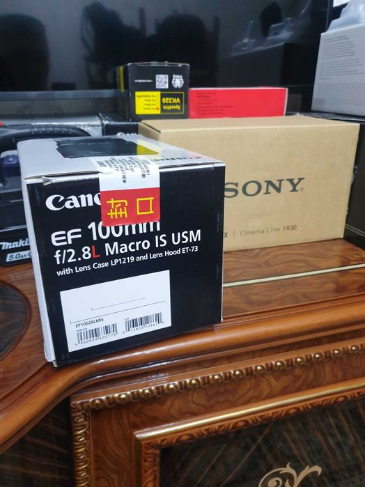 Кенон EF 100macro 2.8 новая в упаковке.запечатан