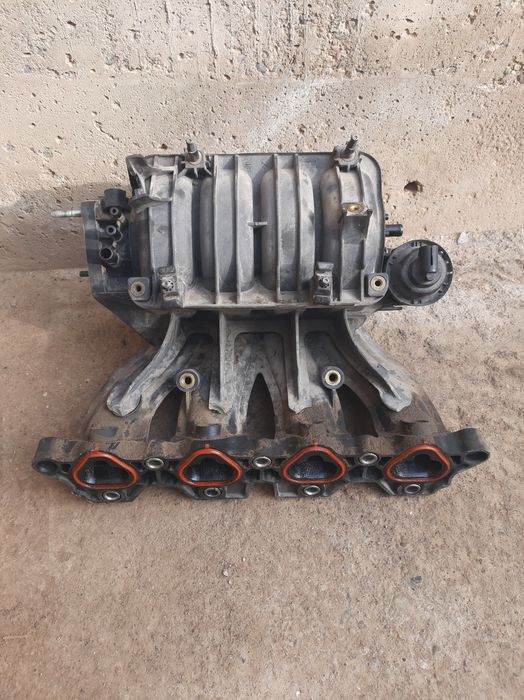 Коллектор б/у 1.6 маторники сотилади