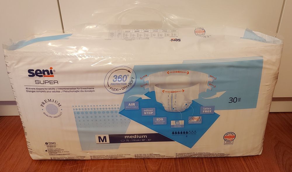 Vând 4 pachete scutece Seni adulti