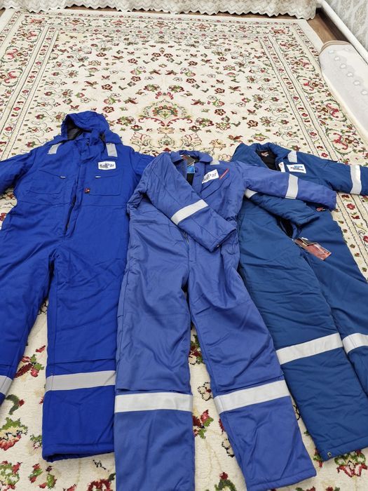 Продам зимние комбезы