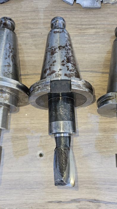 Lot of ISO 50 industrial tooling – arbors, milling heads, and boring head