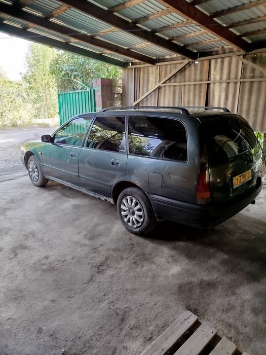 Ниссан примера w10