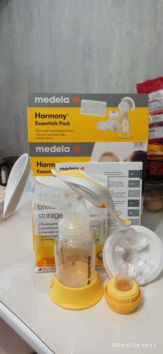 Молокоотсос Medela