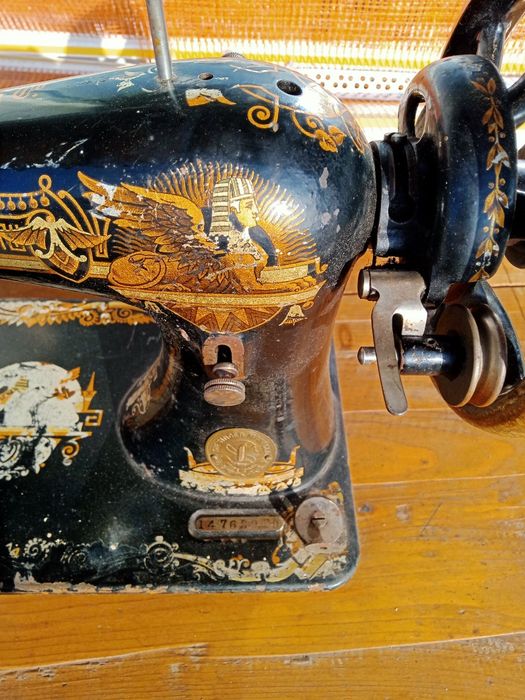 Mașină de cusut Singer