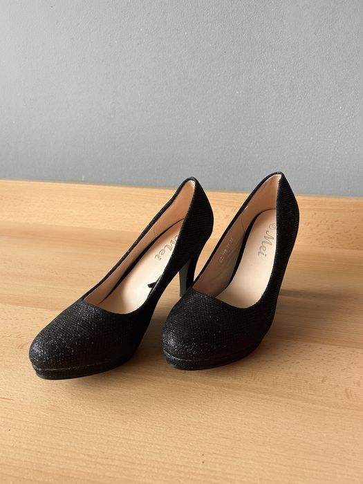 Обувки с висок ток