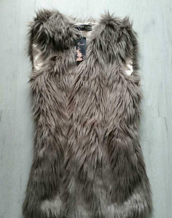 НОВИ !! Дамски пухени елеци