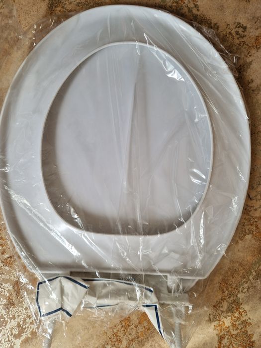 Крышка для унитаза .