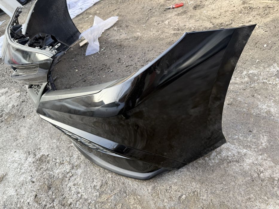 Бампер оригинал камри 75 амириканец