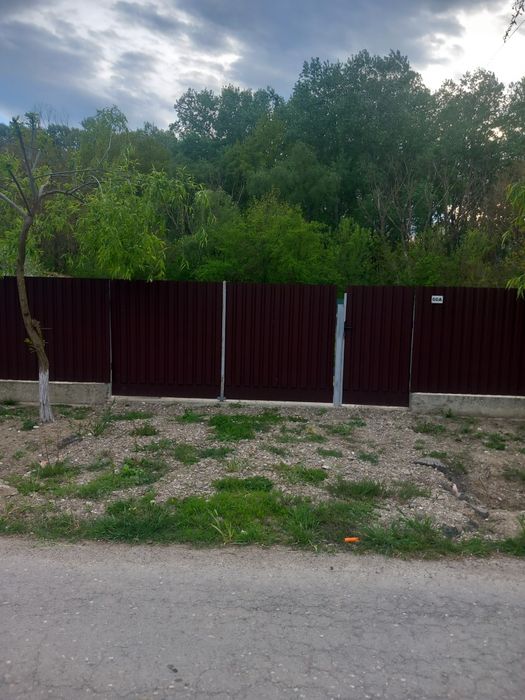 Teren intravilan,  deschidere 14m , 450mp  zona liniștită.