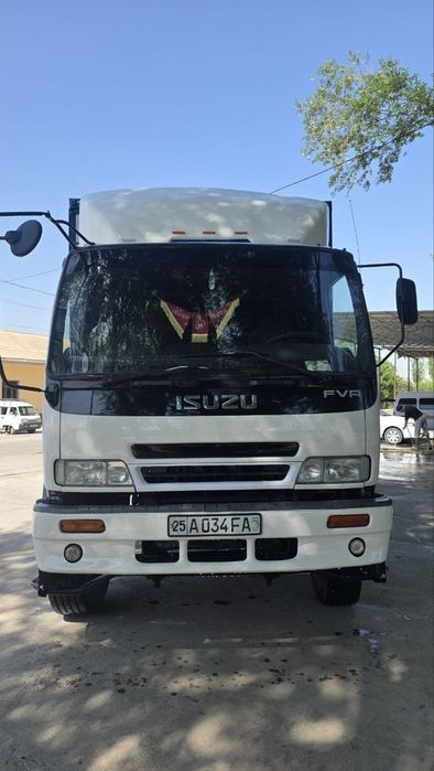 Isuzu Katta bort yuk tashuvchi (10 tonnali)