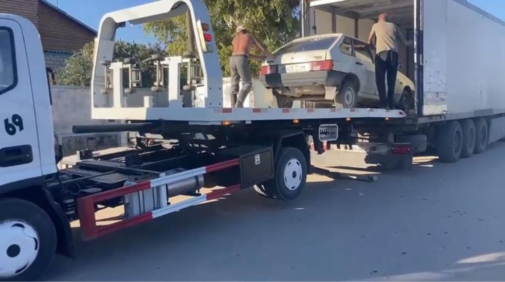 Эвакуатор с гидро площадкой.