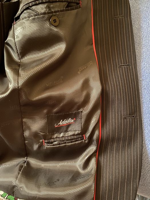 sacou , vesta și pantaloni .