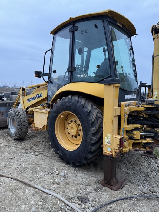 De vanzare buldoexcavator komatsu 2011