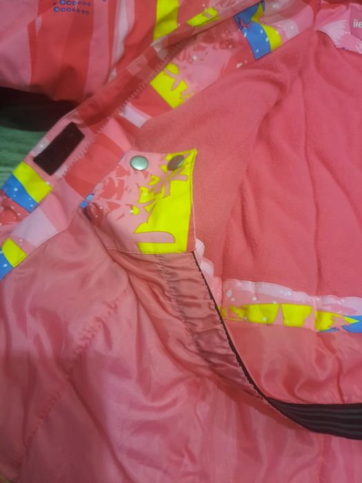 Продам тёплый комбенезон на девочку роставка 128 см.