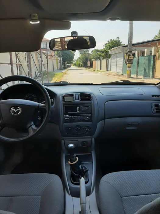 Mazda 323f, бензин 1.3- 72к.с