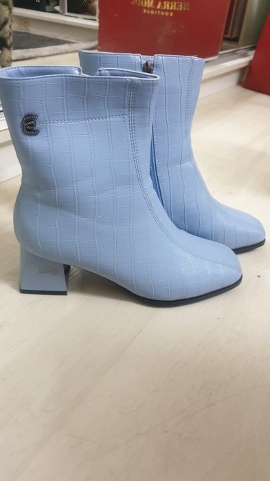 Продам Сапоги теплые.