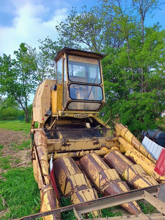 Combina New Holland M122, cu masa de 3 metri pret 2000 euro, zero șapte șase unu, trei doi noua, paru 21