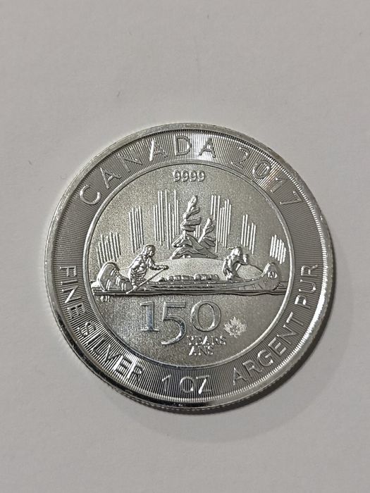 Сребърни монети и сребърен юбилен герб Елизабет 2